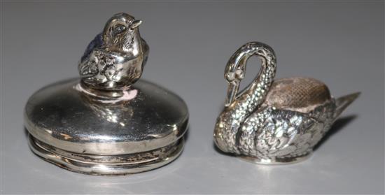 Novelty silver chick pin cushion on base, Levi & Salaman and a Boots Pure Drug Company swan pin cushion